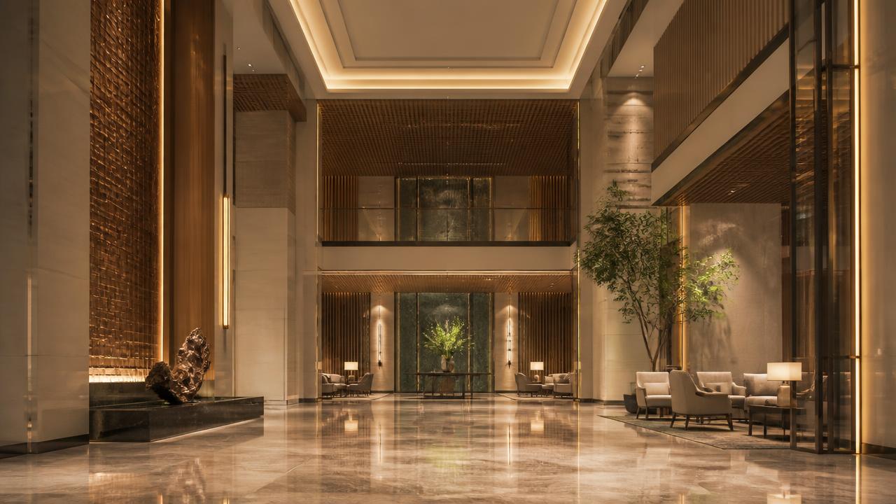 Double-height hotel lobby, representing the hospitality and retail sector